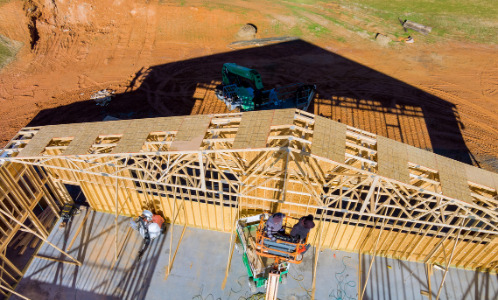 roofer working with framing inst (1) (2)